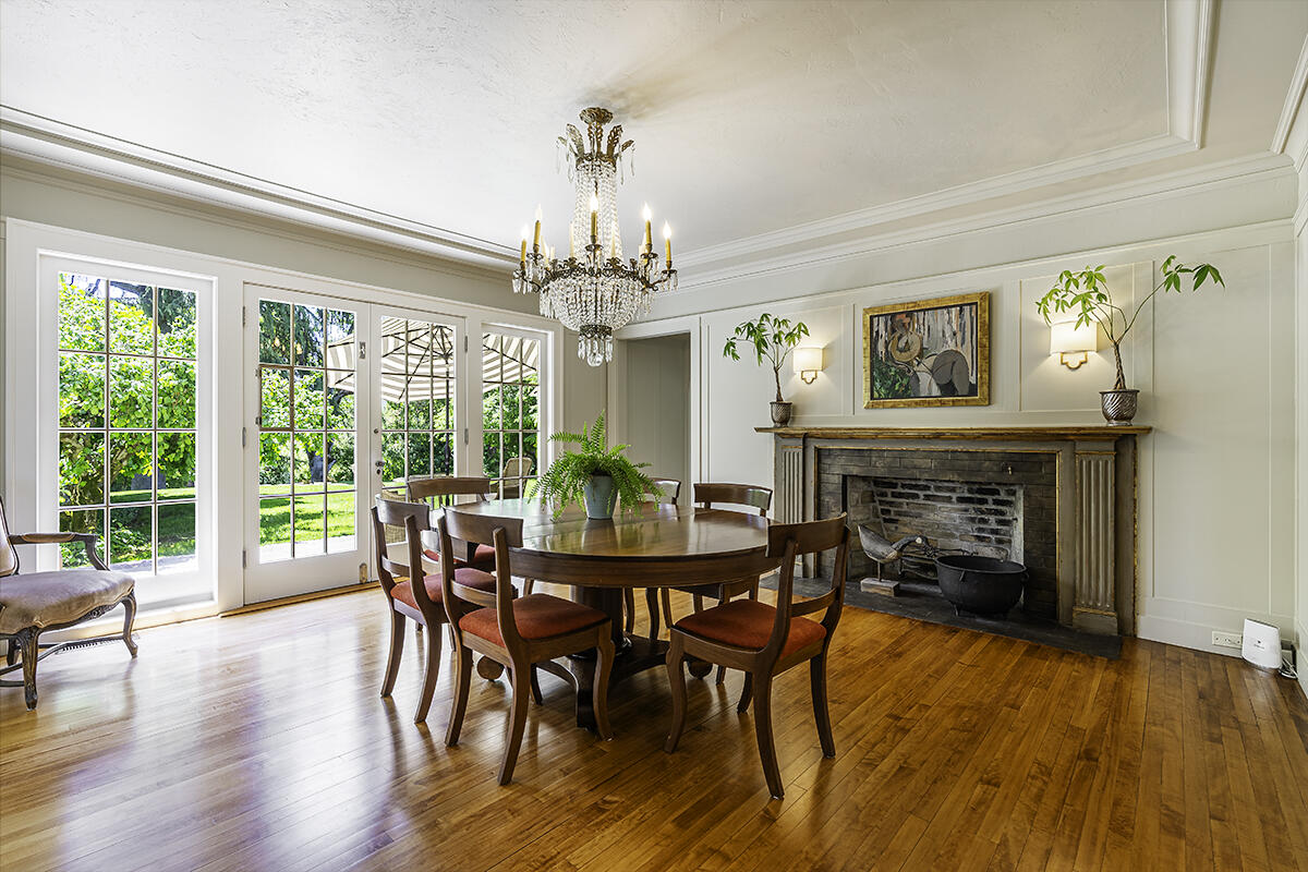 Main house kitchen open to the sunroom & formal dining room.