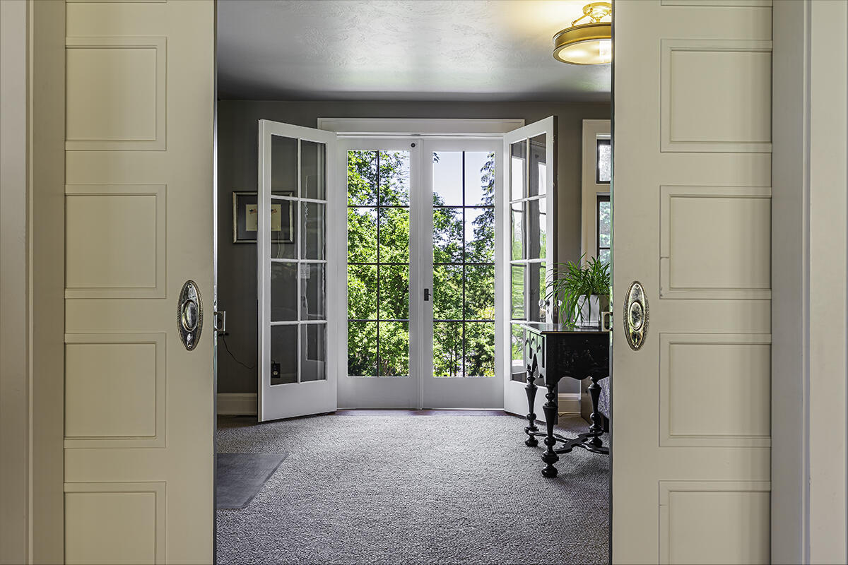 Wood burning fireplace in main house formal living room.