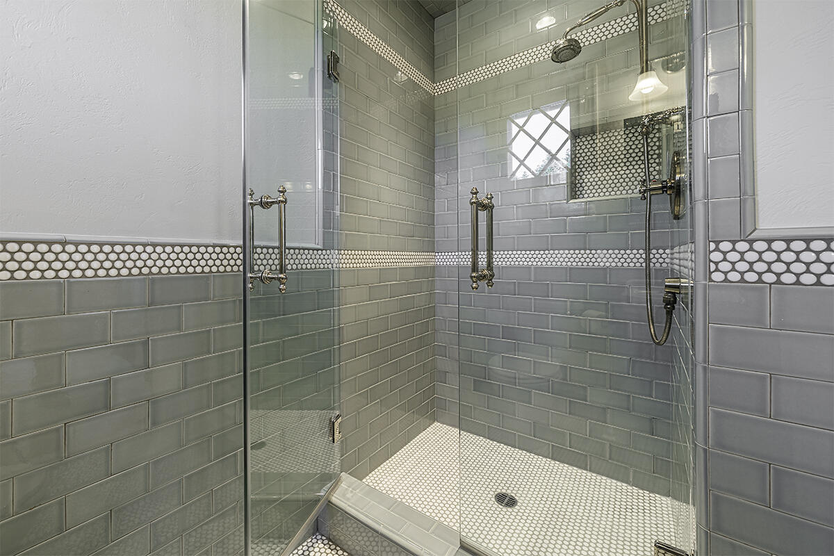 2nd level hallway with French doors that open to the balcony.